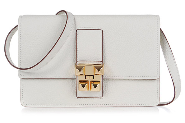 Hermes white jean togo leather gold closure flap bag.