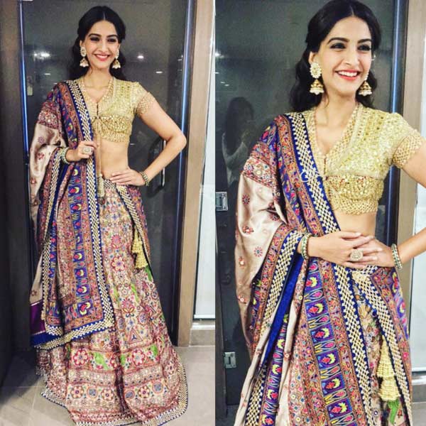 How can she pull off such decadent outfits like this designers Abu Jani and Sandeep Khosla lehenga like it is no big deal...!