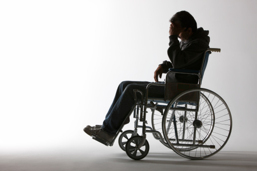 A man sitting in a wheelchair.To see more of my medical images click on the link below